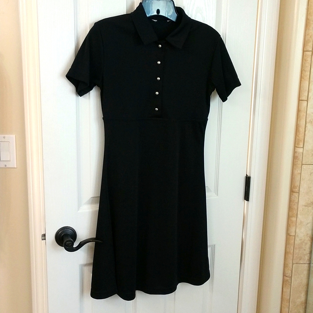 Black A-Line short sleeve above the knee dress.